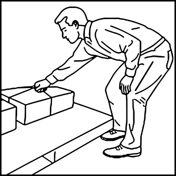A man bending over to lift a box from a pallet on the floor.
