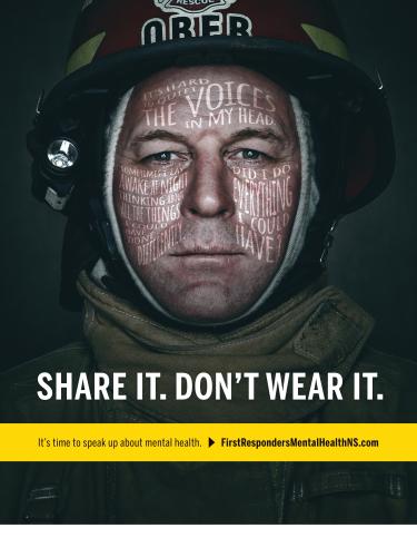 Close-up photograph of a Firefighter with text over the image mentioning "Share It. Don't Wear It.